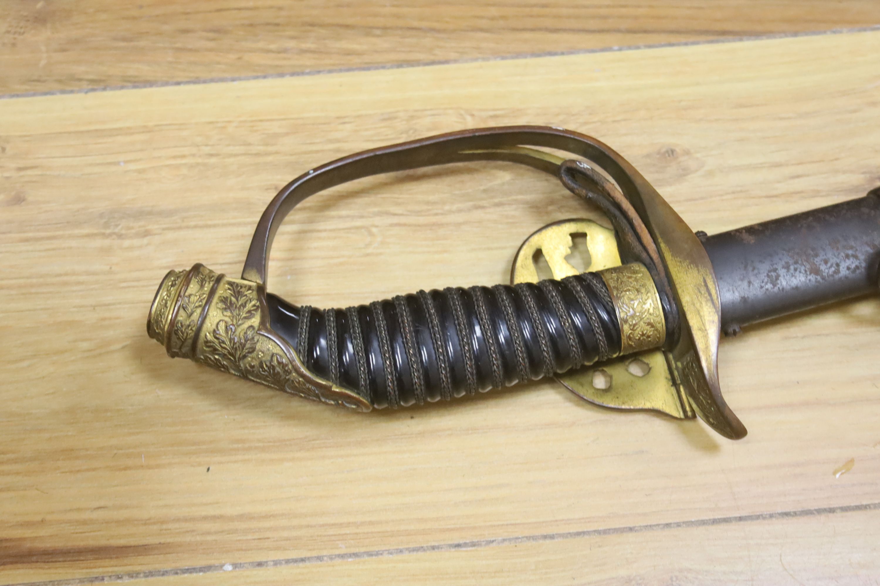 A late 19th century German Officer's sword, overall length 99cm, Carl Eickhorn blade